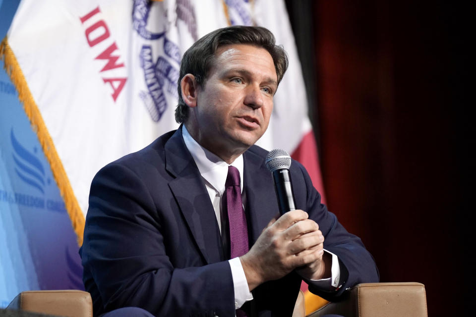 FILE - Republican presidential candidate Florida Gov. Ron DeSantis speaks at the Iowa Faith & Freedom Coalition's fall banquet, Saturday, Sept. 16, 2023, in Des Moines, Iowa. DeSantis' team this week announced it was moving roughly 20 of his Florida-based national campaign staff to Iowa. (AP Photo/Bryon Houlgrave, File)