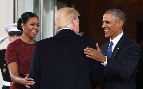 Mrs Obama said her body 'buzzed with fury' when she saw the Access Hollywood tape of US President Donald Trump bragging about sexually assaulting women - Credit: Jim Watson /AFP