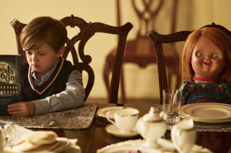 Callum Vinson invites Chucky to breakfast. Photo courtesy of SYFY