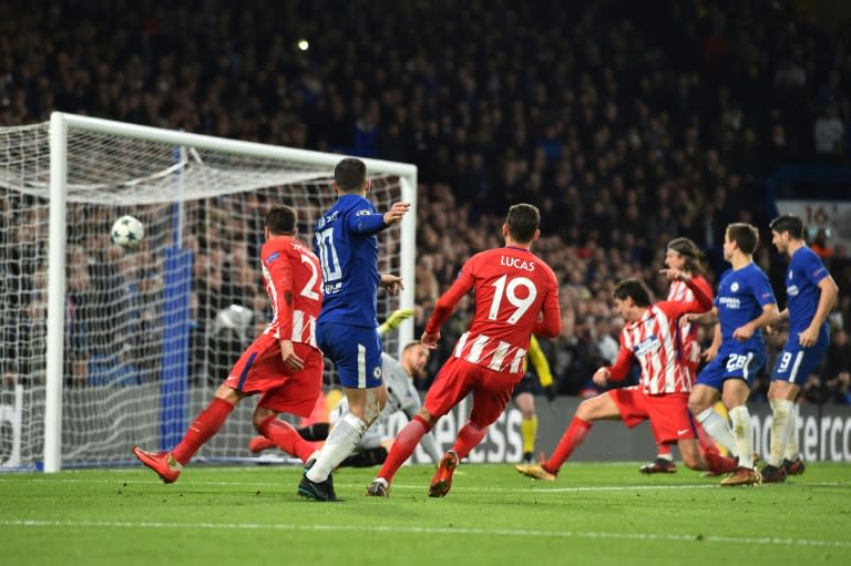 Chelsea blew their chance to finish top of Group C in the Champions League as they were held to a 1-1 draw by Atletico Madrid despite a Stefan Savic (R) own goal 