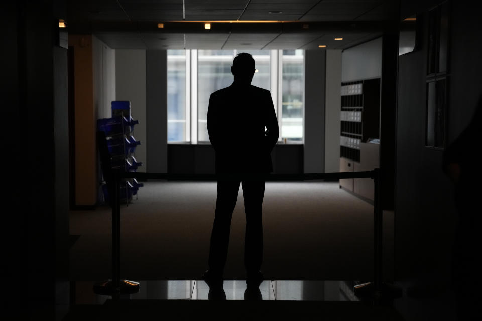 A security officer gathers in a corridor after searching the office of German MEP Maximilian Krah at the European Parliament in Brussels, Tuesday May, 7, 2024. Germany's top prosecutor's office says that authorities are searching the European parliament office of Maximilian Krah, the Alternative for Germany party's top candidate in the upcoming European Parliament elections. Krah, has been under scrutiny after an assistant of his was arrested last month on suspicion of spying for China. (AP Photo/Virginia Mayo)