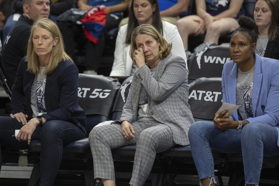 Minnesota Lynx coach Cheryl Reeve wipes away a tear on the bench during the fourth quarter of the team's WNBA basketball game against the Seattle Storm on Friday, Aug. 12, 2022, in Minneapolis. (Elizabeth Flores/Star Tribune via AP)