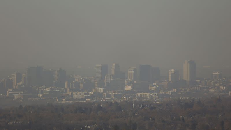 Smog fills the air over Salt Lake City on Friday, Dec. 3, 2021. Federal grant funding has been used to get air purifiers into about 70% of Utah schools, according to Utah Physicians for a Healthy Environment.