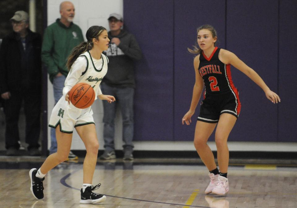 Huntington's Emma Hinshaw drives toward the paint during the Huntsmen's preseason scrimmage against the Westfall Mustangs on Nov. 17, 2023 at Unioto High School.