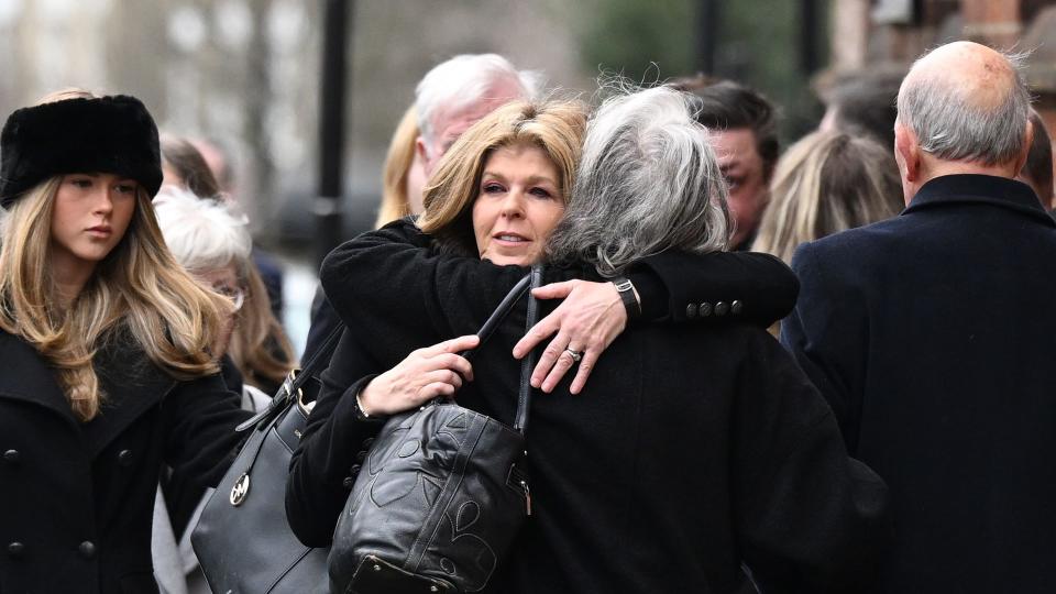 Kate Garraway was seen hugging some of her family ahead of the service