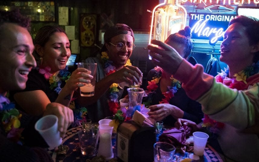 Revellers drink at a restaurant in the US capital of Washington DC. CREDIT: BLOOMBERG - BLOOMBERG