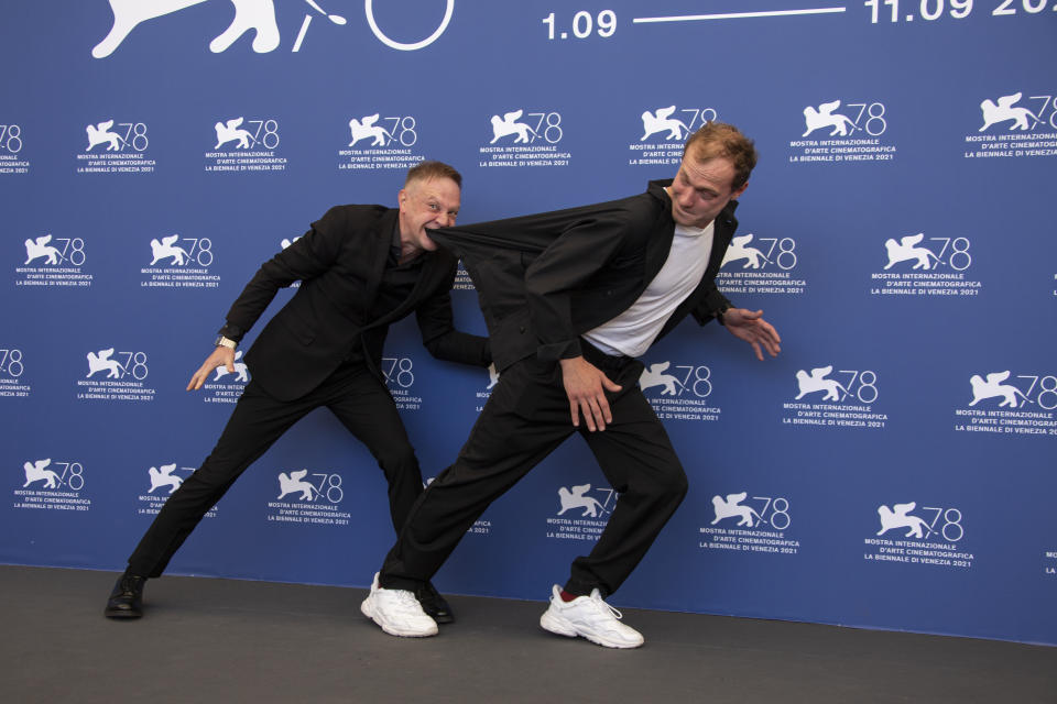 FILE - In this Sept, 8, 2021 file photo Timofey Tribuntsev, left, and Yuriy Borisov pose for photographers at the photo call for the film 'Kapitan Volkonogov Bezhal' during the 78th edition of the Venice Film Festival in Venice, Italy (Photo by Joel C Ryan/Invision/AP, File)