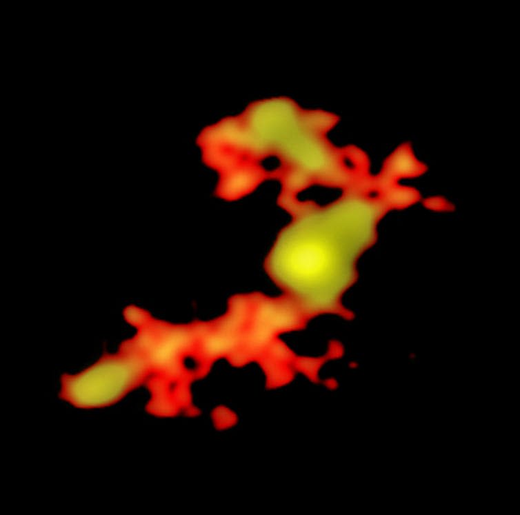 <span class="caption">ALMA image of W2246-0526 and its companions feeding it through trans-galactic streamers.</span> <span class="attribution"><span class="source">T. Diaz-Santos et al.; N. Lira; ALMA (ESO/NAOJ/NRAO)</span></span>
