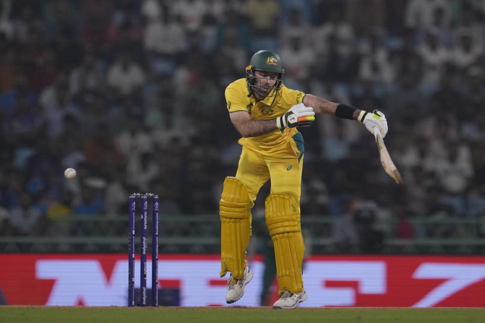 Australia's Glenn Maxwell reacts after being hit by a delivery during the ICC Cricket World Cup match between Australia and South Africa in Lucknow, India, Thursday, Oct. 12, 2023. (AP Photo/Altaf Qadri)