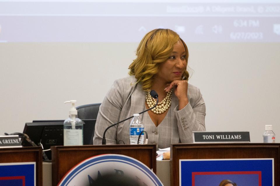 Interim Superintendent Toni Williams smiles while Memphis-Shelby County Schools school board member Keith Williams praises the job she has done during the MSCS school board meeting in Memphis, Tenn., on Tuesday, June 27, 2023. 