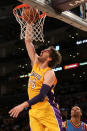 LOS ANGELES, CA - MAY 19: Pau Gasol #16 of the Los Angeles Lakers dunks the ball in front of Russell Westbrook #0 of the Oklahoma City Thunder in the first quarter in Game Four of the Western Conference Semifinals in the 2012 NBA Playoffs on May 19 at Staples Center in Los Angeles, California. NOTE TO USER: User expressly acknowledges and agrees that, by downloading and or using this photograph, User is consenting to the terms and conditions of the Getty Images License Agreement. (Photo by Stephen Dunn/Getty Images)