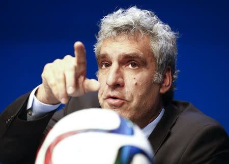 Walter De Gregorio, FIFA Director of Communications and Public Affairs gestures during a news conference at FIFA headquarters in Zurich, Switzerland, May 27, 2015. REUTERS/Ruben Sprich