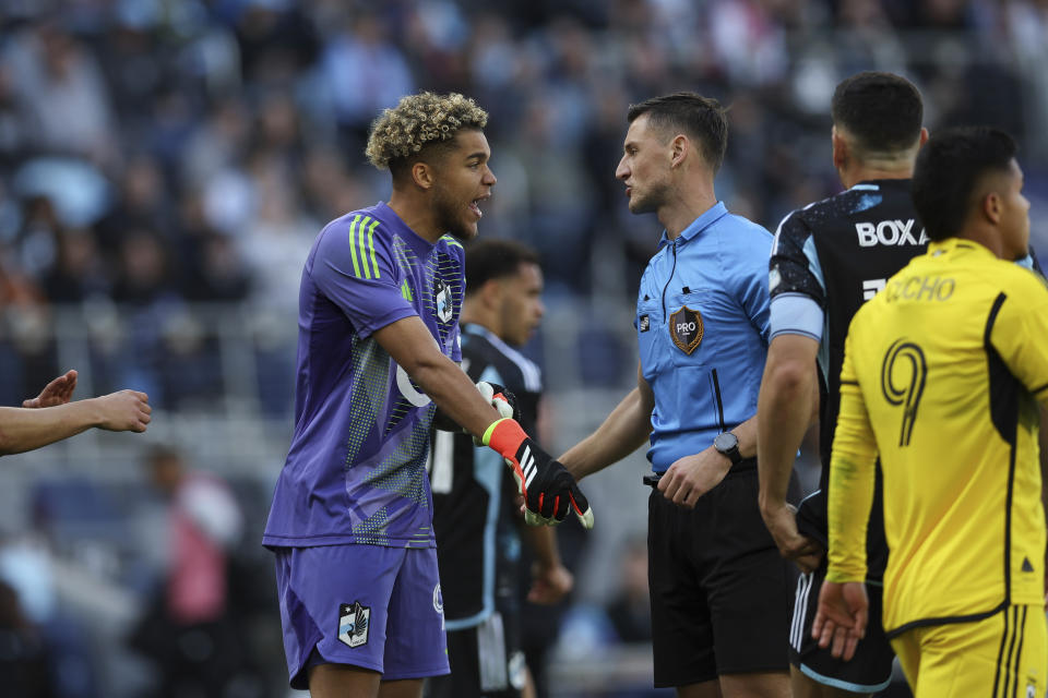 Minnesota United goalkeeper Dayne St. Clair (97) reacts after a play during the second half of an MLS soccer match against the Columbus Crew, Saturday, March 2, 2024, in St. Paul, Minn. The game ended in a 1-1 draw. (AP Photo/Stacy Bengs)