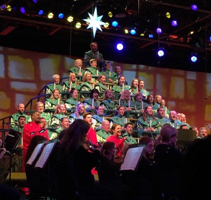 The Candlelight Processional at EPCOT features the hope-filled Christmas story, shared by a celebrity narrator and with a 50-piece orchestra, herald trumpets and the Voices of Liberty.