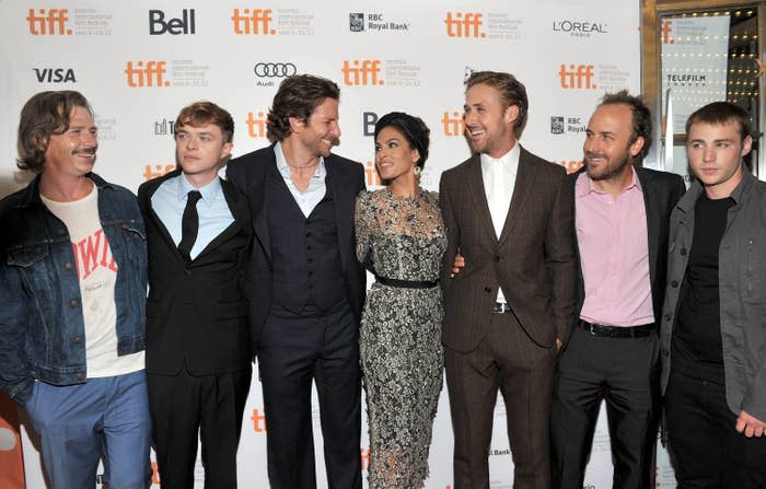 The cast of "The Place Beyond the Pines" stand with their arms around each other