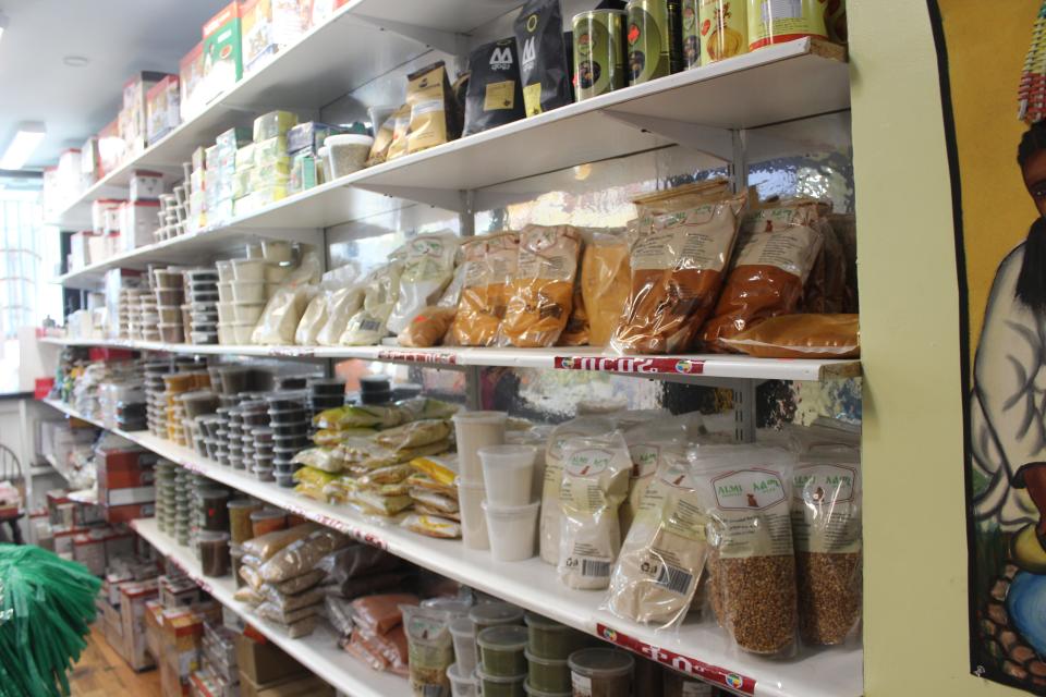 Rows of spices, seasonings, tea and coffee are available for customers to purchase at Merkato Ethiopian Market & Grocery.