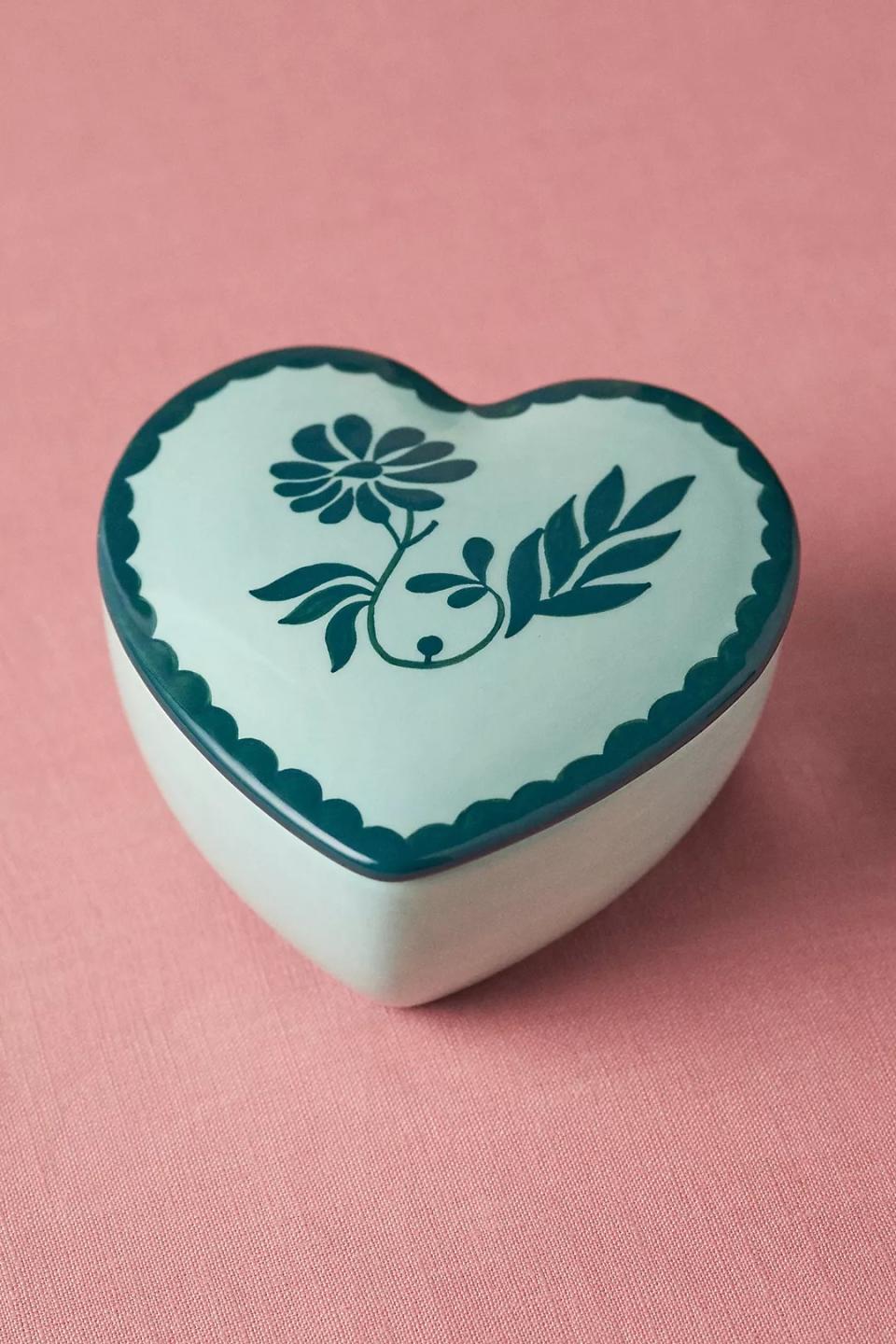 blue and teal heart-shaped candle