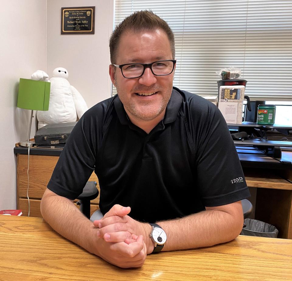 Wade Ashby, assistant professor of computer science at Hardin-Simmons University - with Baymax from the movie "Big Hero 6."