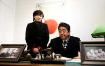 Japan's Prime Minister Shinzo Abe and his wife Akie Abe visit a former home of Chiune Sugihara, a Jew-saving Japanese diplomat, in Kaunas, Lithuania January 14, 2018. REUTERS/Ints Kalnins