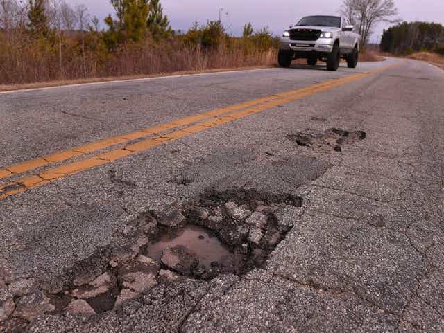 Potholes on Old Canaan Road in Spartanburg County, which county maintenance crews filled after it was reported.