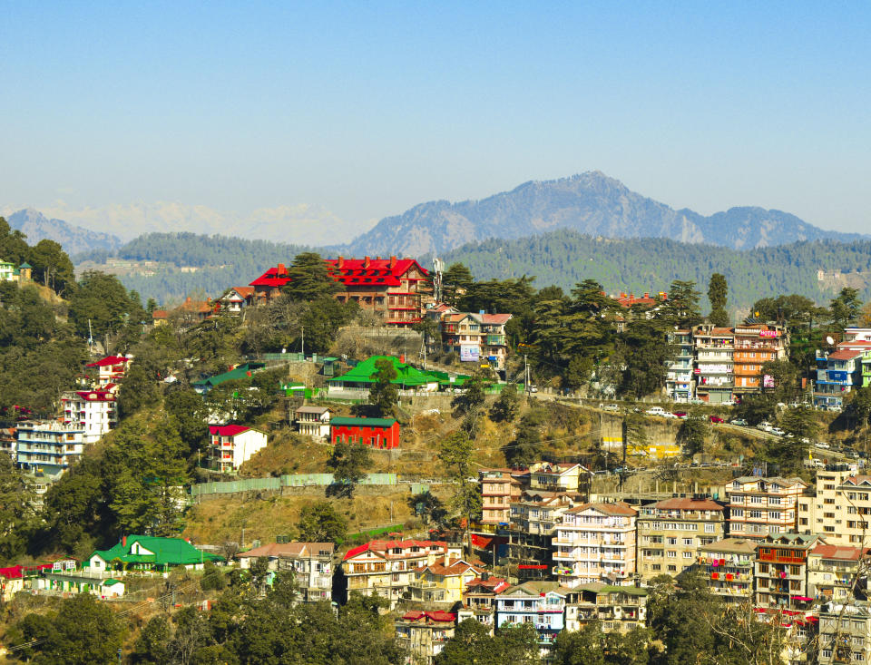 View of mountain with houses in shimla