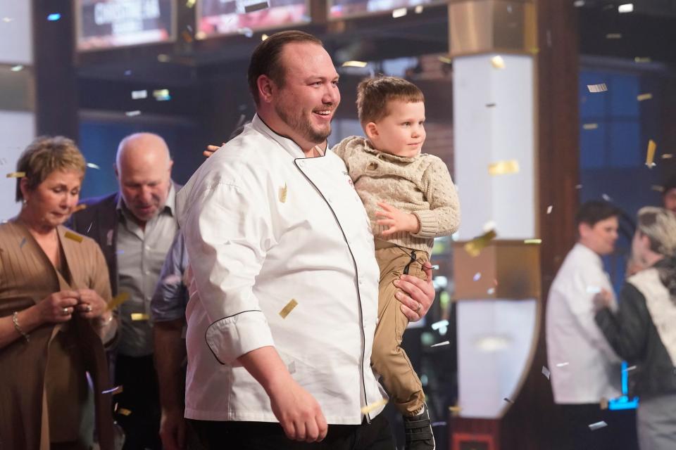 Grant Gillon from Altoona won "MasterChef" in 2023. Here he holds his son, Grady, with his parents in the background.