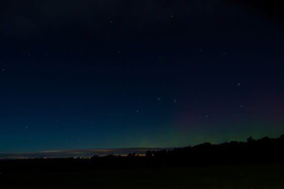 College senior Tyler Baldino sent in this amazing photo of an aurora and the stars of the Big Dipper as seen from Canton, New York, just outside of St. Lawrence University, about 20 miles south of the St. Lawrence River. The image was taken on