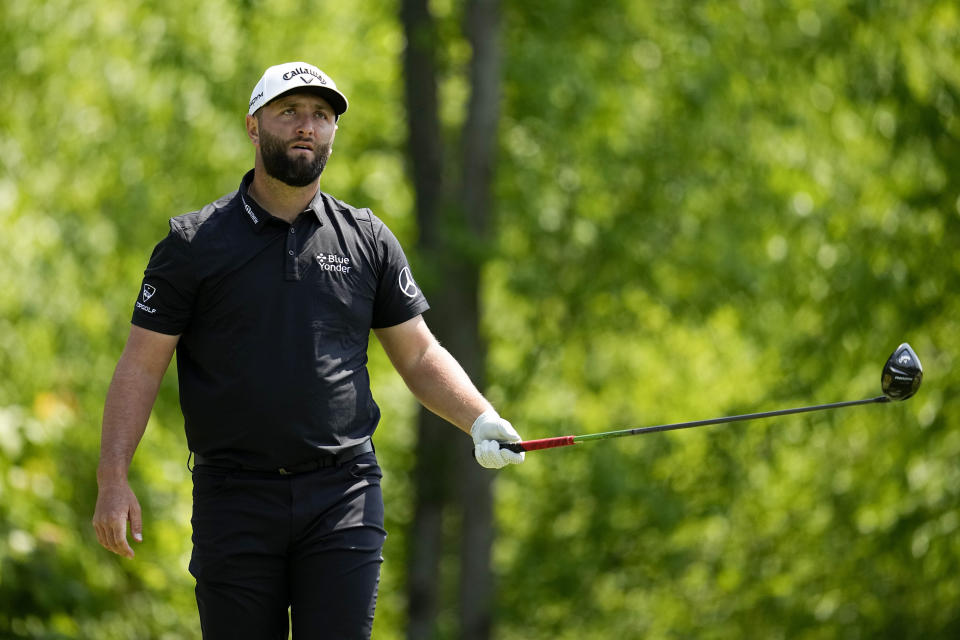 Jon Rahm, of Spain, watches his tee shot on the fourth hole during the first round of the PGA Championship golf tournament at Oak Hill Country Club on Thursday, May 18, 2023, in Pittsford, N.Y. (AP Photo/Abbie Parr)