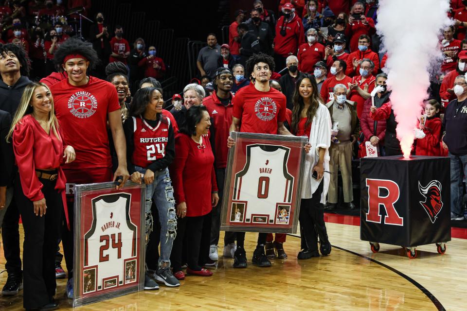 Rutgers Scarlet Knights forward Ron Harper Jr. (24, at left) with his mother Maria Harper (far left) on Senior Day