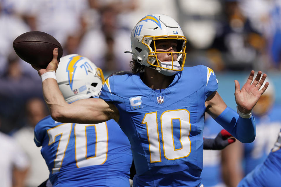 Los Angeles Chargers quarterback Justin Herbert throws during the second half of an NFL football game against the Tennessee Titans Sunday, Sept. 17, 2023, in Nashville, Tenn. (AP Photo/George Walker IV)