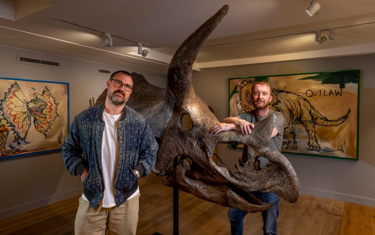 James Golding (left) and Mike Snelle, aka The Connor Brothers, with Tracey, the triceratops - Andrew Crowley