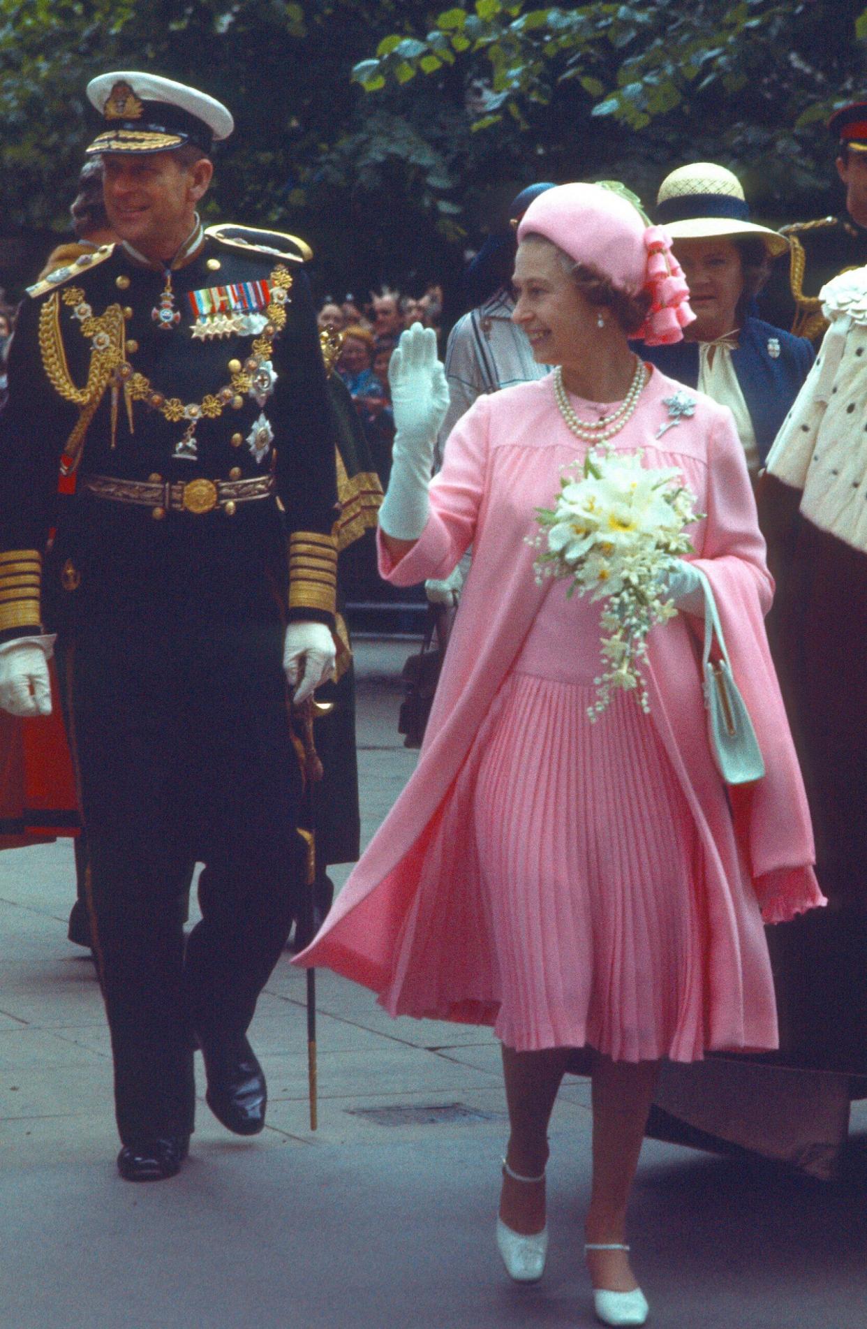 Queen Elizabeth ll and Prince Philip, Duke of Edinburgh greet the public during a Silver Jubilee