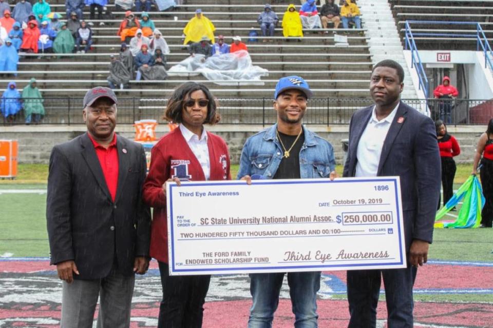 From left, SC State President James E. Clark, SCSUNAA 1st Vice President Sharon Wigfall, Charlamagne Tha God, SCSUNAA President John J. Funny.