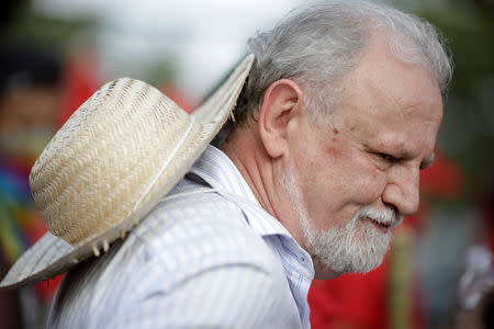 Landless Workers' Movement (MST) leader Joao Pedro Stedile is seen among the supporters of imprisoned former Brazil's President Luis Inacio Lula da Silva during a march before his Workers' Party (PT) officially registers his presidential candidacy, in Brasilia, Brazil, August 15, 2018. REUTERS/Ueslei Marcelino