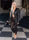 <p>Back in September, Kim Kardashian hit New York to support sister Kendall at Fashion Week.<br><br>And reminding the industry that she is every bit as daring when it comes to her wardrobe, Kim headed to the Daily Front Row’s Fashion Media Awards in a PVC two-piece complete with midriff-riding tights.<br>She finished the look with a leather jacket and peroxide locks. <em>[Photo: Getty]</em> </p>