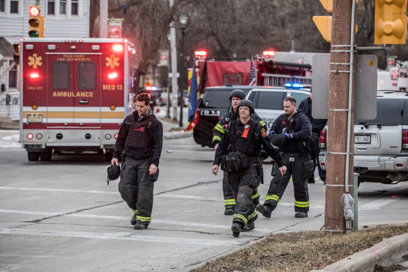 Police investigate a shooting at the Molson Coors headquarters in Milwaukee, Wisconsin