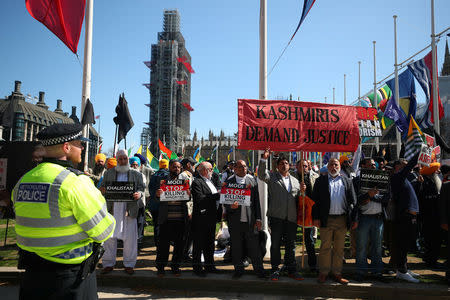 Demonstrators stage a protest against the visit by India's Prime Minister Narendra Modi in Parliament Square, London, Britain, April 18, 2018. REUTERS/Hannah McKay