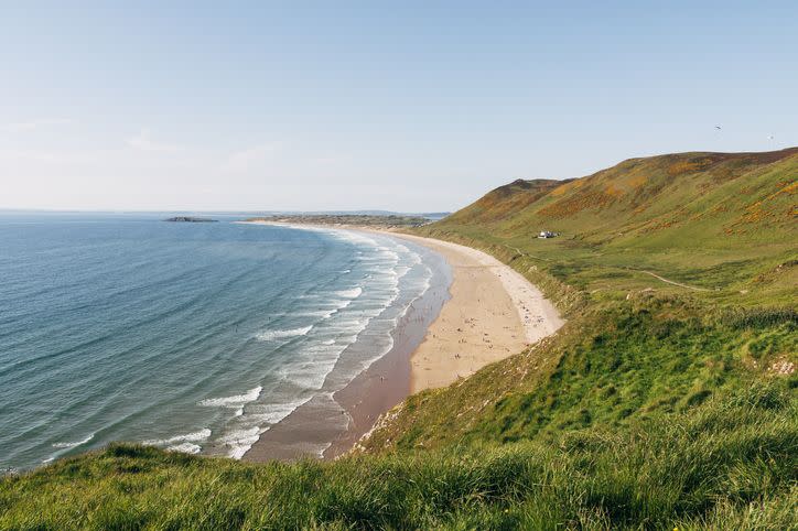 <p>Remote Rhossili Bay has a long list of accolades and has been named the ‘best beach in Europe’ and ‘top ten beaches in the world’. One visit here and it’s easy to see why it's an award-winning sandy beach. The steep, winding walk down to the coast from Rhossili village is stunning, with panoramic views over three miles of golden sand, and on clear days, to the coastline of North Devon. </p><p><a class="link " href="https://www.visitswanseabay.com/listings/rhossili-bay-beach/" rel="nofollow noopener" target="_blank" data-ylk="slk:MORE INFO;elm:context_link;itc:0;sec:content-canvas">MORE INFO</a></p><p><strong>Where to stay: </strong>Featuring sea views, <a href="https://www.booking.com/hotel/gb/creek-cottage-swansea.en-gb.html?aid=2070935&label=sandy-beaches" rel="nofollow noopener" target="_blank" data-ylk="slk:Creek Cottage;elm:context_link;itc:0;sec:content-canvas" class="link ">Creek Cottage</a> sleeps four and provides the perfect base for your next sandy beach break. Enjoy a fully-equipped kitchen, dining room and cosy living room, where you can spread out and relax after a day building sandcastles. </p><p><a class="link " href="https://www.booking.com/hotel/gb/creek-cottage-swansea.en-gb.html?aid=2070935&label=sandy-beaches" rel="nofollow noopener" target="_blank" data-ylk="slk:CHECK PRICES;elm:context_link;itc:0;sec:content-canvas">CHECK PRICES</a></p>