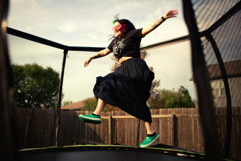 AUSTIN, TX - May 21: Moony Hernandez, 25, wears a pair of Crocs shoes from her collection on Friday, May 21, 2021 in Austin, Texas. Hernandez is known as the Croc girl at her tech support job. (Photo by Mary Kang for The Washington Post via Getty Images)