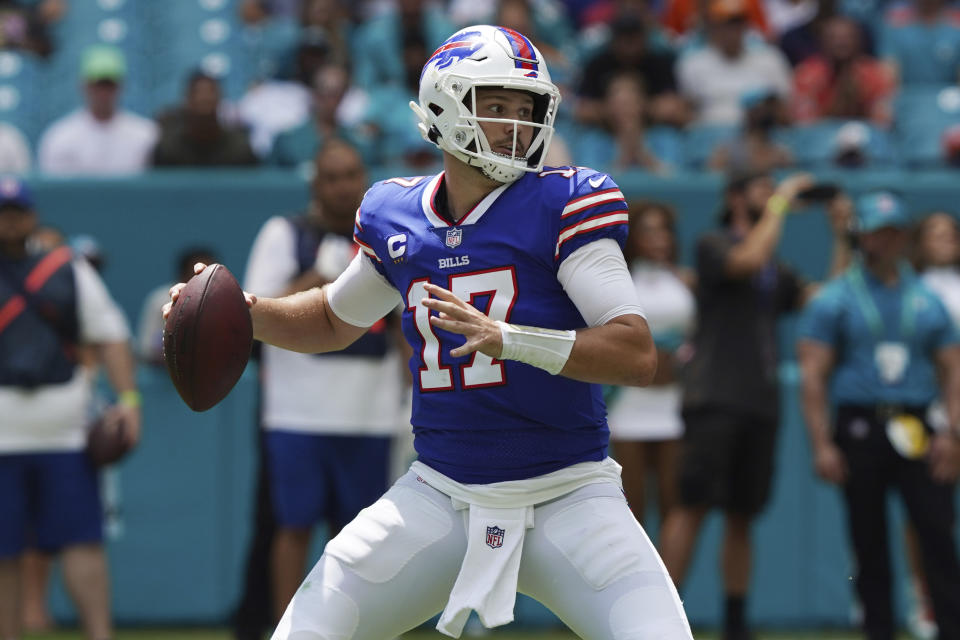 Buffalo Bills quarterback Josh Allen (17) aims a pass during the first half of an NFL football game against the Miami Dolphins, Sunday, Sept. 19, 2021, in Miami Gardens, Fla. (AP Photo/Hans Deryk)