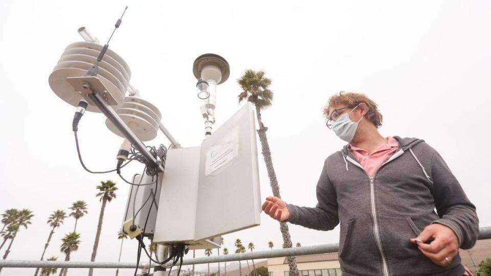 Karl Tupper of the Air Pollution Control District in San Luis Obispo County, California, describes what a temporary PM2.5 air quality sensor does. San Luis Obispo County got an F for short-term particle pollution on its American Lung Association’s 2024 State of the Air report card.