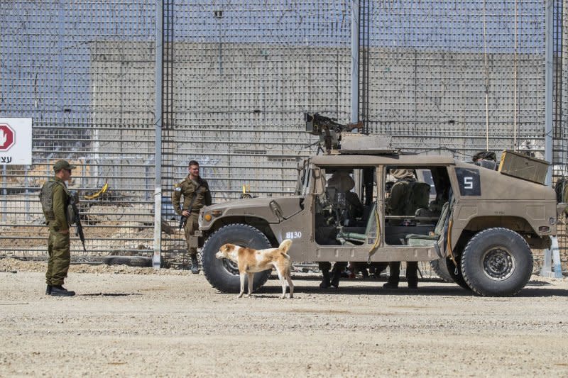 Israeli soldiers at Humvees at the Erez Crossing checking as some 30 trucks of humanitarian aid crosses into northern Gaza on Sunday. Photo by Jim Hollander/UPI