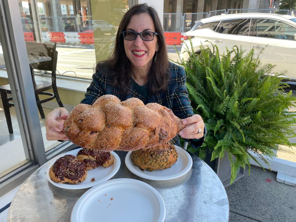 Lohud Food & Dining Reporter Jeanne Muchnick with chocolate chip challah from The Kneaded Bread in Port Chester. Photographed Oct. 19, 2023