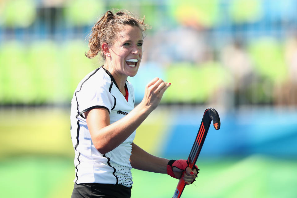 RIO DE JANEIRO, BRAZIL - AUGUST 17:  Janne Muller-Wieland of Germany celebrates scoring a goal during the penalty shootout in the womens semifinal match between the Netherlands and Germany on Day 12 of the Rio 2016 Olympic Games at the Olympic Hockey Centre on August 17, 2016 in Rio de Janeiro, Brazil.  (Photo by Mark Kolbe/Getty Images)