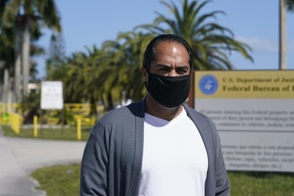 Kareen Troitino stands outside the Federal Corrections Institution, Friday, March 12, 2021, in Miami. Troitino, a local correction's officer union president, said that fewer than half of the facility's 240 employees have been fully vaccinated as of March 11. Many of the workers who refused had expressed concerns about the vaccine’s efficacy and side effects, Troitino said. (AP Photo/Marta Lavandier)