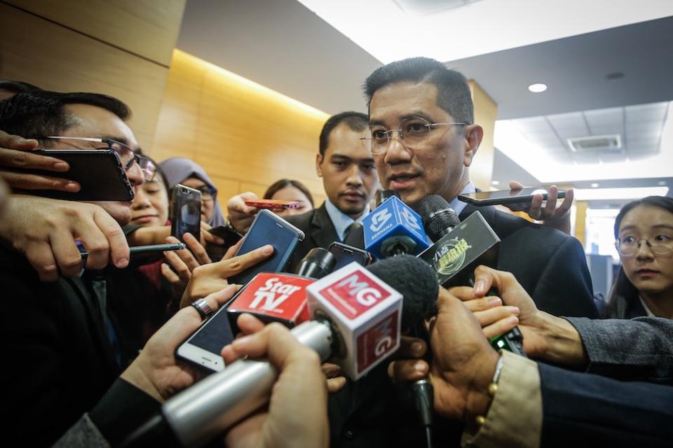 Economic Affairs Minister, Datuk Seri Azmin Ali, speaks to reporters in the lobby of Parliament November 19, 2019. — Picture by Hari Anggara