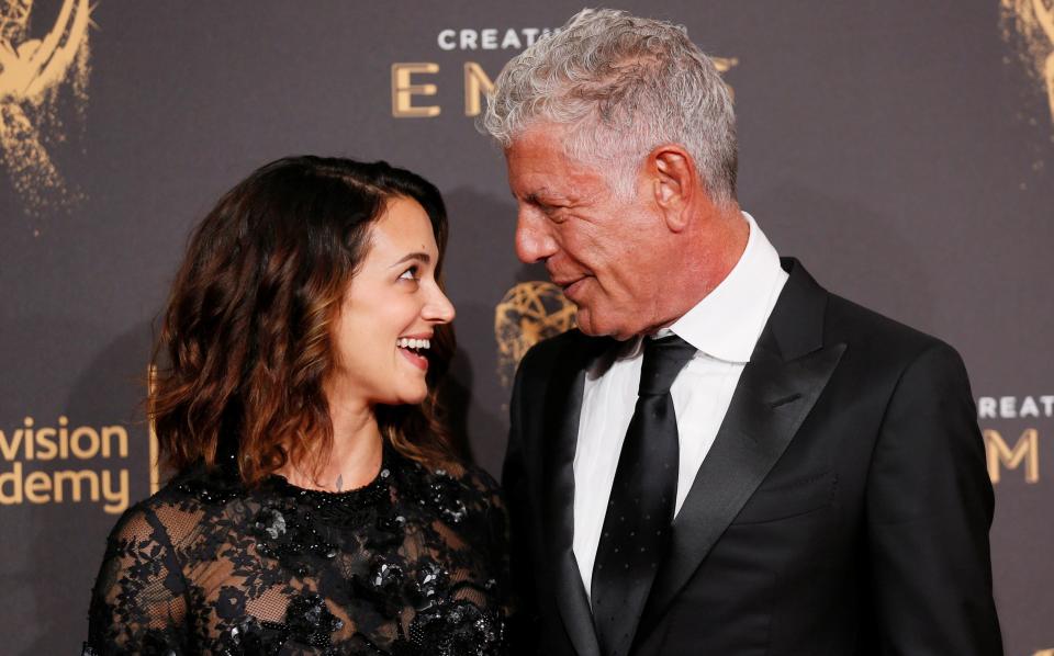 Bourdain and Argento at the Emmys on Sept. 9, 2017.&nbsp; (Photo: Danny Moloshok / Reuters)