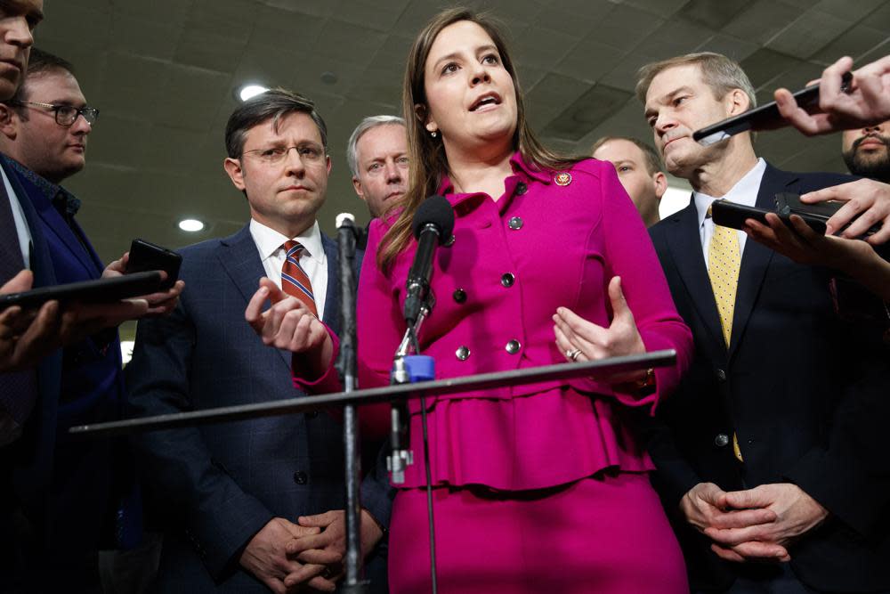 In this Jan. 23, 2020, file photo Rep. Elise Stefanik, R-N.Y., center, accompanied by from left, Rep. Mike Johnson, R-La., Rep. Mark Meadows, R-N.C., Rep. Lee Zeldin, R-N.Y. and Rep. Jim Jordan, R-Ohio, speaks to the media before the impeachment trial of President Donald Trump on Capitol Hill in Washington. (AP Photo/ Jacquelyn Martin, File)