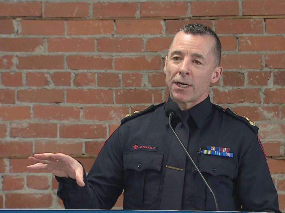 CPS Chief Constable Mark Neufeld speaks at a news conference on Feb. 14, 2023. (CBC - image credit)