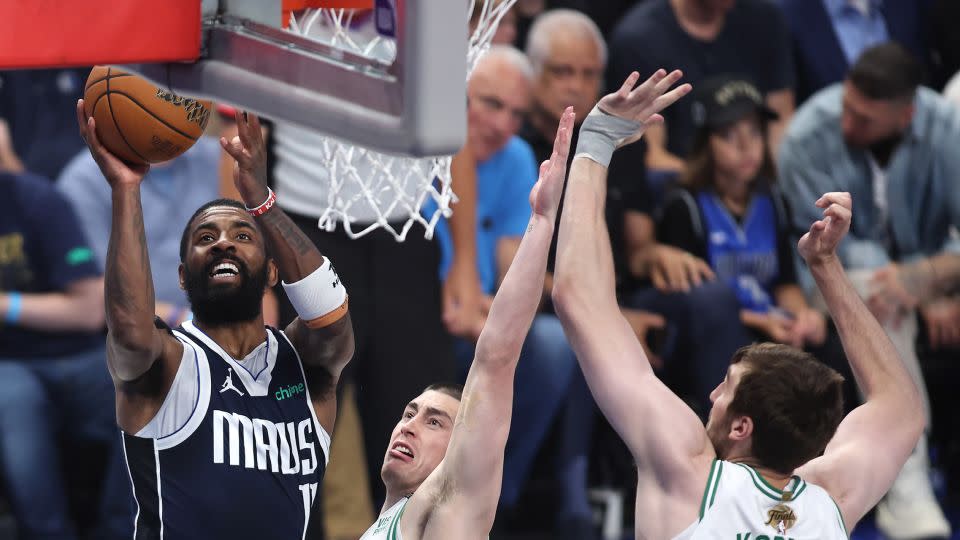 Kyrie Irving of the Dallas Mavericks shoots the ball against the Boston Celtics during Game Four of the 2024 NBA Finals at American Airlines Center in Dallas, Texas, on June 14, 2024. - Tim Heitman/Getty Images